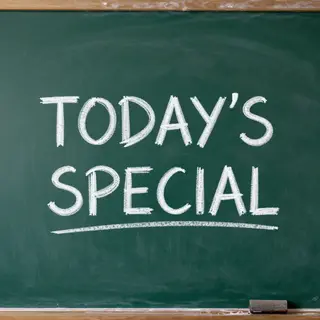 The phrase 'TODAY'S SPECIAL' written in white chalk on a dar