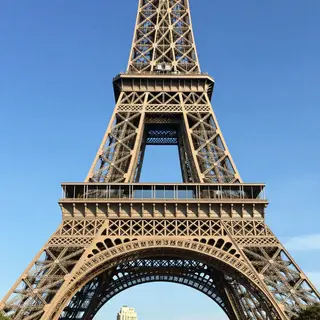 The Eiffel Tower in Paris on a clear day, architecturally ac