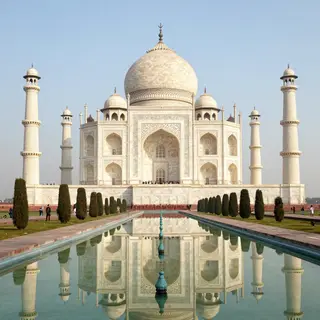 The Taj Mahal in Agra seen from the reflecting pool, with ac