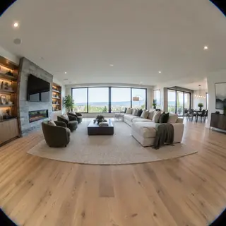 A wide-angle shot of a modern living room interior showing e