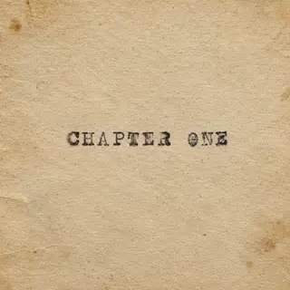 The word 'CHAPTER ONE' typed on aged paper with a vintage ty