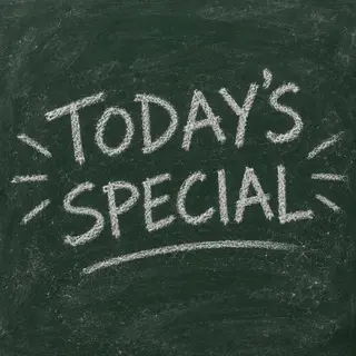 The phrase 'TODAY'S SPECIAL' written in white chalk on a dar