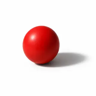 A red sphere on a white surface with a single shadow cast to