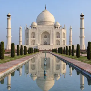 The Taj Mahal in Agra seen from the reflecting pool, with ac