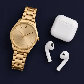A product flat-lay on a #1A1A2E (deep dark blue) background,