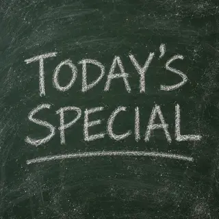 The phrase 'TODAY'S SPECIAL' written in white chalk on a dar