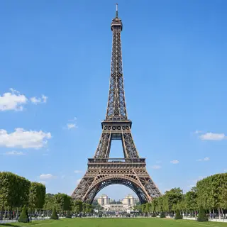 The Eiffel Tower in Paris on a clear day, architecturally ac