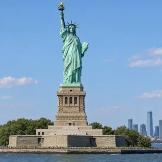 The Statue of Liberty on her island pedestal, with correct t