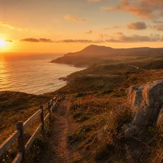 A landscape photograph bathed in golden hour light — long wa