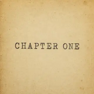 The word 'CHAPTER ONE' typed on aged paper with a vintage ty