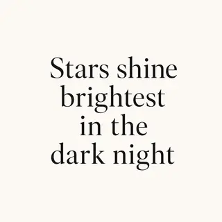 'Stars shine brightest in the dark night' displayed on a cle