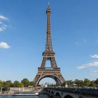 The Eiffel Tower in Paris on a clear day, architecturally ac