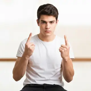 A person counting to three on their fingers, with index, mid