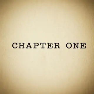 The word 'CHAPTER ONE' typed on aged paper with a vintage ty