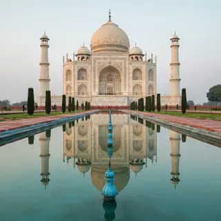The Taj Mahal in Agra seen from the reflecting pool, with ac