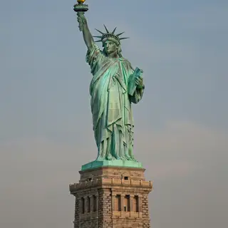The Statue of Liberty on her island pedestal, with correct t
