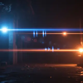 A cinematic frame with blue and orange anamorphic lens flare