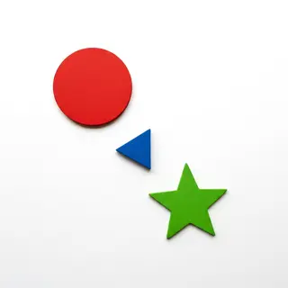 A large red circle, a small blue triangle, and a medium gree