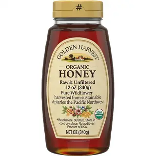 A product label for 'GOLDEN HARVEST ORGANIC HONEY' with subt