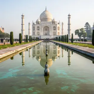 The Taj Mahal in Agra seen from the reflecting pool, with ac