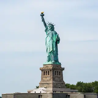 The Statue of Liberty on her island pedestal, with correct t