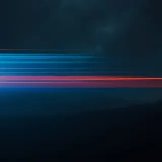A cinematic frame with blue and orange anamorphic lens flare