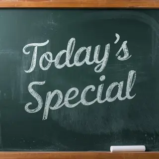 The phrase 'TODAY'S SPECIAL' written in white chalk on a dar