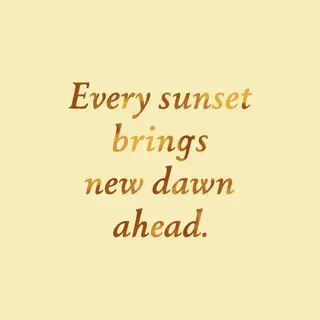 'Every sunset brings a new dawn ahead' written neatly on a p