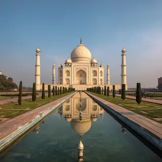 The Taj Mahal in Agra seen from the reflecting pool, with ac