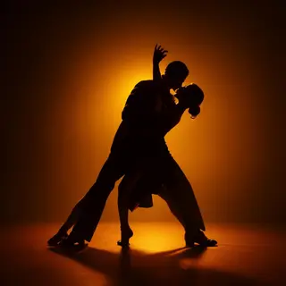 Two tango dancers in a close embrace, the man dipping the wo