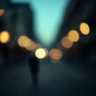 A street photograph with shallow depth of field as if shot a