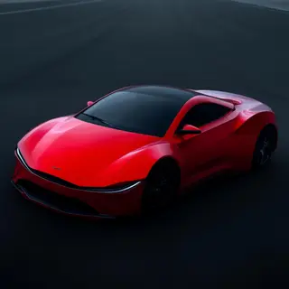 A bright red sports car parked on a gray asphalt road — the 