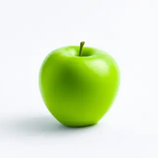 A ripe green apple on a seamless white background with soft 