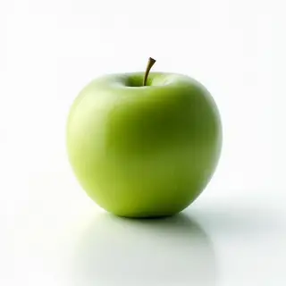 A ripe green apple on a seamless white background with soft 