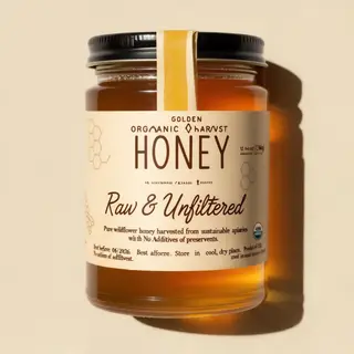 A product label for 'GOLDEN HARVEST ORGANIC HONEY' with subt