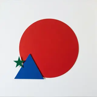 A large red circle, a small blue triangle, and a medium gree