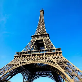 The Eiffel Tower in Paris on a clear day, architecturally ac