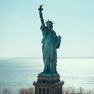 The Statue of Liberty on her island pedestal, with correct t