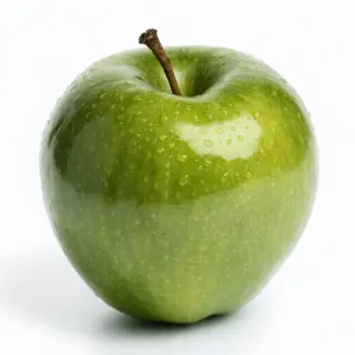 A ripe green apple on a seamless white background with soft 