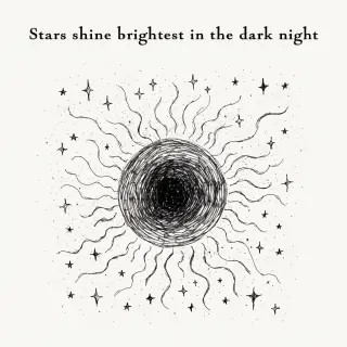 'Stars shine brightest in the dark night' displayed on a cle