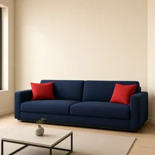 A minimalist room with walls in #F5E6CC (warm cream), a sofa