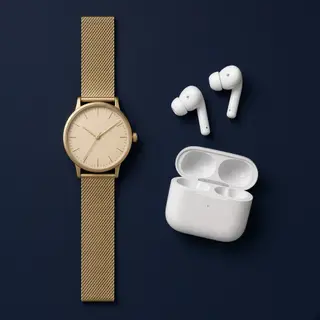 A product flat-lay on a #1A1A2E (deep dark blue) background,