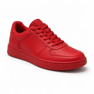 A single red sneaker on a clean white background with soft s